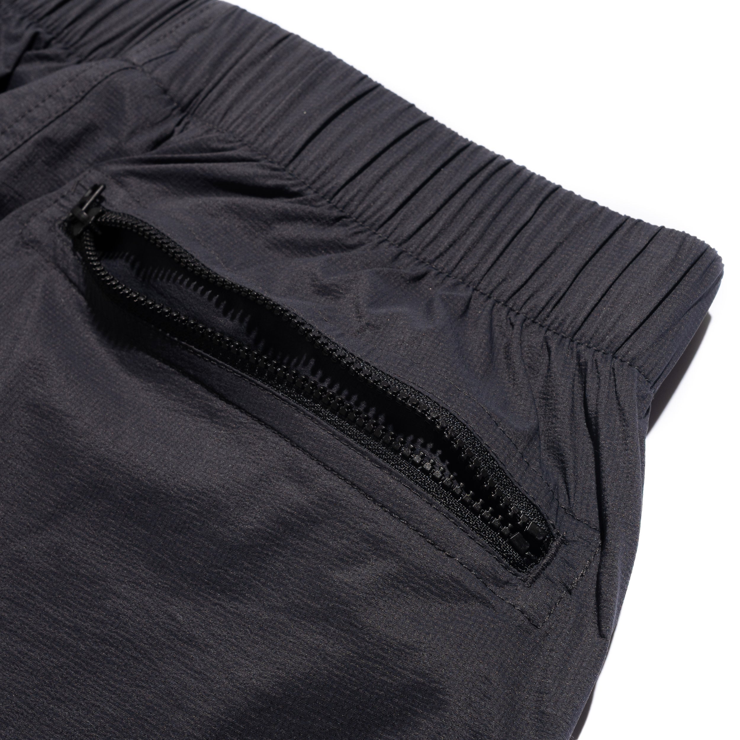 TNF Red Box Wind Pant Obsidian NF0A8EFV