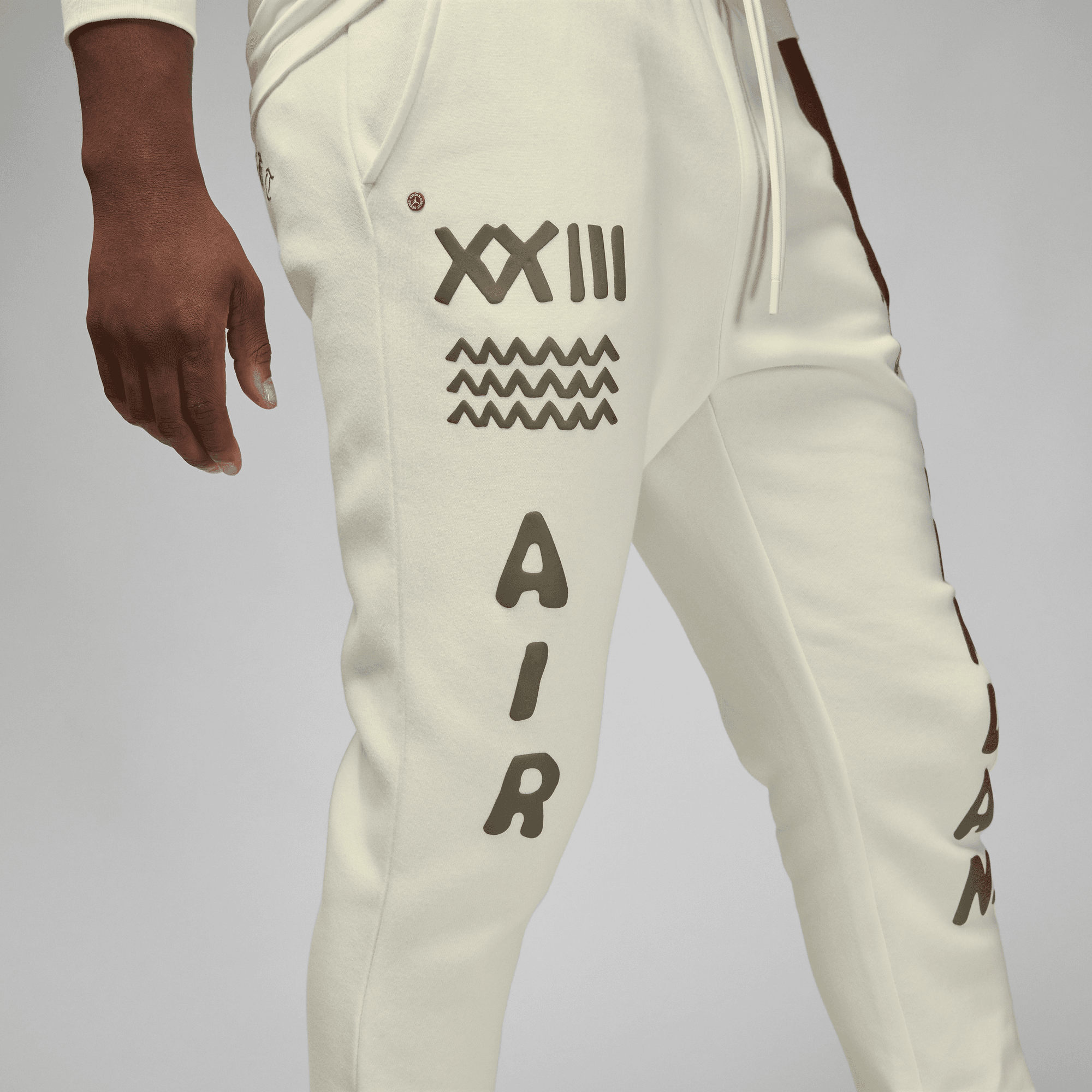 Jordan poly tape track pants on sale